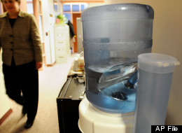 A Poland Spring water dispenser. Only the 3- and 5- gallon Poland Spring water bottles are believed to be affected. (AP Photo/George Ruhe)