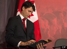 Justin Trudeau checks notes on his iPad as he takes part in the Liberal Leadership debate in Mississauga Ont., Saturday, February 16, 2013. (THE CANADIAN PRESS/Chris Young)