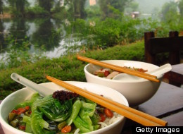 Bowl of round rice noodles with chopsticks and spoons is pictured on a table in Yangshuo, China. (Photo via Getty Images)