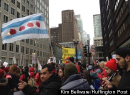 Union members, parents and students from CPS schools swarmed the Loop Wednesday evening to protest the district's plan to close 54 schools. (Kim Bellware/HuffPost)