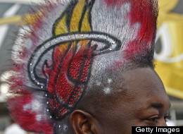 Gasmy Joseph shows off his white-hot Heat Mohawk before the start of Game 6 of the NBA Finals between the Miami Heat and the Dallas Mavericks at the AmericanAirlines Arena in Miami, Florida, Sunday, June 12, 2011. (Al Diaz/Miami Herald/MCT via Getty Images)