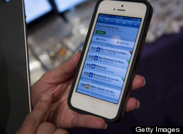 Not only is smartphone ownership way up in Canada, users are getting increasingly addicted to their mobile devices, suggests a new report released by Google. (Scott Eells/Bloomberg via Getty Images)