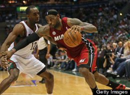 LeBron James #6 of the Miami Heat drives against Luc Richard Mbah a Moute #12 of the Milwaukee Bucks in Game Four of the Eastern Conference Quarterfinals during the 2013 NBA Playoffs at the Bradley Center on April 28, 2013 in Milwaukee, Wisconsin.