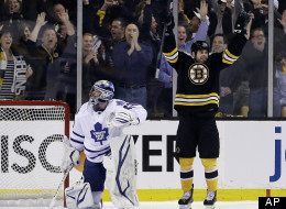 Boston Bruins right wing Nathan Horton, right, celebrates his goal against Toronto Maple Leafs goalie James Reimer (34) in the first period in Game 1 of a first-round NHL hockey playoff series in Boston, Wednesday, May 1, 2013. (AP Photo/Elise Amendola)