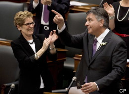 In a last-ditch bid to stay alive and avoid an election, Ontario's minority Liberals revealed a $127.6-billion budget Thursday awash in NDP orange along with the red ink. (CP)