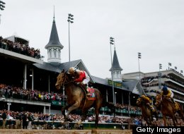 Joel Rosario atop Orb on his way to winning the 139th running of the Kentucky Derby at Churchill Downs on May 4, 2013 in Louisville, Kentucky.