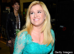 Kelly Clarkson recently defended Pink against fans who were angry she canceled a concert due to illness. Here, Clarkson attends the Academy of Country Music Awards on April 7 in Las Vegas. (Frazer Harrison/ACMA2013/Getty Images for ACM)