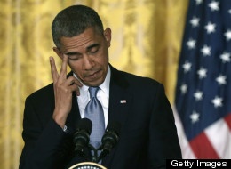 President Barack Obama holds a joint press conference with British Prime Minister David Cameron on May 13, 2013, in Washington. (Photo by Alex Wong/Getty Images)