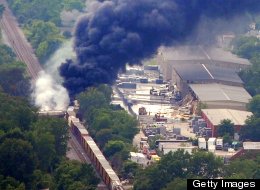 Plumes of smoke from a cargo train that derailed fills the sky in Rosedale, Maryland, Tuesday, May 28, 2013. (Kim Hairston/Baltimore Sun/MCT via Getty Images)