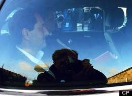Montreal Mayor Michael Applebaum is taken away by police after being arrested at his home in Montreal on Monday, June 17, 2013. THE CANADIAN PRESS/Mario Beauregard