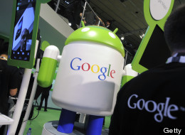 An Android operating software icon sits on display with a Google Inc. logo at the Google booth at the Mobile World Congress in Barcelona, Spain, on Wednesday, Feb. 29, 2012. The Mobile World Congress, operated by the GSMA, expects 60,000 visitors and 1400 companies to attend the four-day technology industry event which runs Feb. 27 through March 1. Photographer: Denis Doyle/Bloomberg via Getty Images