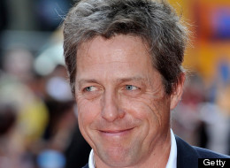 Hugh Grant attends the premiere of 'Alan Partidge: Alpha Papa' at Vue July 24, 2013 in London, England, showing off his naturally grey hair. (Photo by Gareth Cattermole/Getty Images)