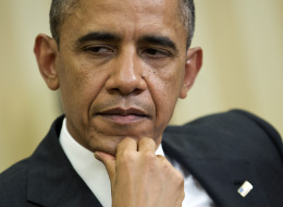 U.S. President Barack Obama listens during a meeting with Hamad bin Khalifa al-Thani, the Amir of Qatar, unseen, in the Oval Office of the White House on Tuesday, April 23, 2013. (Photographer: Joshua Roberts/Bloomberg via Getty Images)