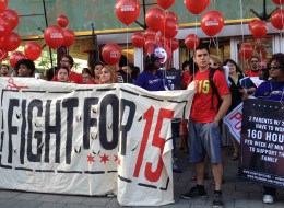 Protesters gathered outside the Rock N' Roll McDonald's at 600 N. Clark St. Thursday morning to protest the company's low wage practices. (Kim Bellware/Huffington Post)
