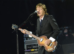 Paul McCartney (pictured performing in San Francisco Aug. 9) could be a costar along with Tom Hanks for one lucky philanthropist. (Photo by C Flanigan/WireImage)
