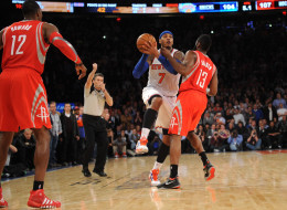 A personal foul is called on James Harden #13 of the Houston Rockets while Carmelo Anthony #7 of the New York Knicks takes a shot with five seconds left in the game at Madison Square Garden on November 14, 2013 in New York City. The Rockets defeat the Knicks 109-106. NOTE TO USER: User expressly acknowledges and agrees that, by downloading and/or using this photograph, user is consenting to the terms and conditions of the Getty Images License Agreement. (Photo by Maddie Meyer/Getty Images)