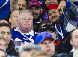 Toronto Mayor Rob Ford watches the Buffalo Bills play the Atlanta Falcons during the first half of NFL action in Toronto, Sunday December 1, 2013. THE CANADIAN PRESS/Mark Blinch