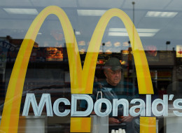 NEW YORK, NY - AUGUST 23: A man stands inside a McDonald's fast food restaurant on August 23, 2013 in the Brooklyn borough of New York City. The fast food industry has been roiled by a growing movement to unionize workers and a call for a living wage of $15 an hour. Labor organizers are calling for fast-food workers across the country to stage a day of strikes on August 29 in what is expected to be the largest event in the ongoing campaign. (Photo by Spencer Platt/Getty Images)