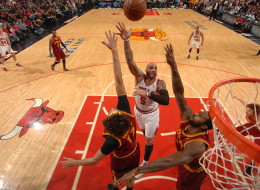 CHICAGO, IL - DECEMBER 21: Carlos Boozer #5 of the Chicago Bulls shoots against the Cleveland Cavaliers on December 21, 2013 at the United Center in Chicago, Illinois. NOTE TO USER: User expressly acknowledges and agrees that, by downloading and/or using this photograph, user is consenting to the terms and conditions of the Getty Images License Agreement. Mandatory Copyright Notice: Copyright 2013 NBAE (Photo by Randy Belice/NBAE via Getty Images)