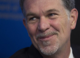 Reed Hastings, chairman, president and chief executive officer of Netflix Inc., smiles during a Broadcasting Board of Governors (BBG) panel discussion in Washington, D.C., U.S., on Wednesday, Dec. 18, 2013. Technology company executives including Hastings left a meeting with President Barack Obama yesterday with no commitment to limit government snooping on Internet traffic, according to an industry official briefed on the session. Photographer: Andrew Harrer/Bloomberg via Getty Images