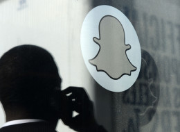 The company's logo is seen at the front entrance of the new headquarters of Snapchat , the popular social network startup that lets users send each other photos which quickly disappear. (Photo by Kevork Djansezian/Getty Images)