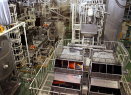 Non-plastics removal equipment operate at the Green Cycle Systems Corp. plant, a subsidiary of Mitsubishi Electric Corp., in Chiba City, Japan, on Wednesday, March 28, 2012. (Photographer: Haruyoshi Yamaguchi/Bloomberg via Getty Images)