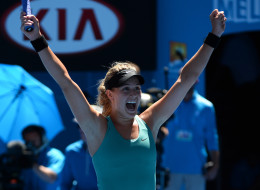 Canada's Eugenie Bouchard celebrates after victory in her women's singles match against Serbia's Ana Ivanovic on day nine at the 2014 Australian Open tennis tournament in Melbourne on January 21. (WILLIAM WEST/AFP/Getty Images)
