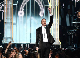 LOS ANGELES, CA - JANUARY 26: Rapper Macklemore performs onstage during the 56th GRAMMY Awards at Staples Center on January 26, 2014 in Los Angeles, California. (Photo by Kevork Djansezian/Getty Images)