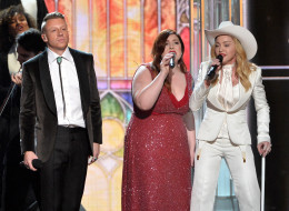 LOS ANGELES, CA - JANUARY 26: (L-R) Rapper Macklemore, singer Mary Lambert and singer Madonna perform onstage during the 56th GRAMMY Awards at Staples Center on January 26, 2014 in Los Angeles, California. (Photo by Kevin Winter/WireImage)