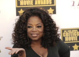 Oprah Winfrey arrives at the 19th Annual Critics' Choice Movie Awards at Barker Hangar on January 16, 2014 in Santa Monica, California. (Photo by C Flanigan/Getty Images)