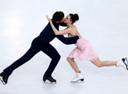 SOCHI, RUSSIA - FEBRUARY 17: Tessa Virtue and Scott Moir of Canada compete in the Figure Skating Ice Dance Free Dance on Day 10 of the Sochi 2014 Winter Olympics at Iceberg Skating Palace on February 17, 2014 in Sochi, . (Photo by Clive Mason/Getty Images)