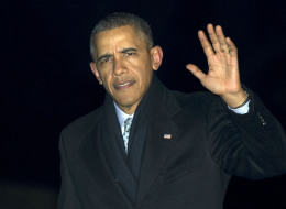 President Barack Obama waves as he arrives at the White House in Washington, Wednesday, March 5, 2014, from a trip to Connecticut. (AP Photo/Manuel Balce Ceneta)