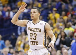 Wichita State's Fred VanVleet signals a three-pointer in the second half of the Missouri Valley Conference tournament championship game. Wichita State Shockers defeated the Indiana State Sycamores, 83-69, in St. Louis on Sunday, March 9, 2014. (Travis Heying/Wichita Eagle/MCT via Getty Images)