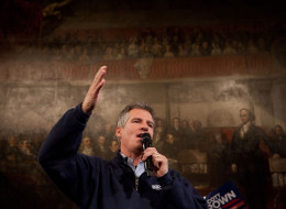 Then-Sen. Scott Brown speaks to the crowd during a rally at Faneuil Hall in Boston on Nov. 4, 2012. (Photo by Kayana Szymczak for The Boston Globe via Getty Images)