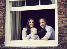 Right as reign! It's a family affair for Prince George, who poses next to his proud parents, Prince William and Kate Middleton, at their Kensington Palace residence, in this new photo, released just in time for UK Mother's Day March 30. (Handout)