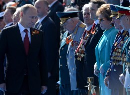 Russia's President Vladimir Putin (L) attends a Victory Day parade at the Red Square in Moscow, on May 9, 2014. (KIRILL KUDRYAVTSEV/AFP/Getty Images)