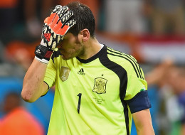 Iker Casillas of Spain reacts after allowing the Netherlands' fourth goal during the 2014 FIFA World Cup Brazil Group B match on June 13, 2014 in Salvador, Brazil.