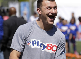 Texas A&M's Johnny Manziel laughs during an NFL football event in New York, Wednesday, May 7, 2014. (Associated Press)