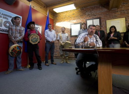 Chief Joe Alphonse, right, of the Tl'etinqox First Nation, is flanked by other chiefs while speaking during a news conference in Vancouver, after the Supreme Court of Canada ruled in favour of the Tsilhqot'in First Nation.