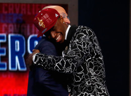 Andrew Wiggins (R) of Kansas embraces NBA Commissioner Adam Silver after Wiggins was drafted #1 overall in the first round by the Cleveland Cavaliers during the 2014 NBA Draft at Barclays Center on June 26, 2014 in the Brooklyn borough of New York City. NOTE TO USER: User expressly acknowledges and agrees that, by downloading and/or using this Photograph, user is consenting to the terms and conditions of the Getty Images License Agreement. (Photo by Mike Stobe/Getty Images)