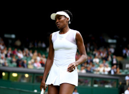 LONDON, ENGLAND - JUNE 27: Venus Williams of the United States during her Ladies' Singles third round match against Petra Kvitova of Czech Republic on day five of the Wimbledon Lawn Tennis Championships at the All England Lawn Tennis and Croquet Club on June 27, 2014 in London, England. (Photo by Al Bello/Getty Images)