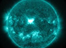 An X1.6 class solar flare flashes in the middle of the sun on Sept. 10, 2014. This image was captured by NASA's Solar Dynamics Observatory and shows light in the 131 Angstrom wavelength, which is typically colorized in teal.