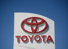 A sign stands outside Hiland Toyota dealership in Moline, Illinois, U.S., on Wednesday, April 9, 2014. Toyota Motor Corp., the world's largest carmaker, called back more than 6 million vehicles to fix a range of safety defects in one of the biggest recalls in automotive history. Photographer: Daniel Acker/Bloomberg via Getty Images