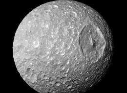 Saturn's moon Mimas. The large Herschel Crater dominates Mimas. Cassini. (Photo by: Universal History Archive/UIG via Getty Images)