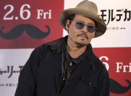 U.S. actor Johnny Depp poses for photographers during a photo session prior to a press conference to promote his latest film 