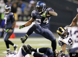 Seattle Seahawks running back Marshawn Lynch leaps (24) runs against the St. Louis Rams in the second half of an NFL football game, Monday, Dec. 12, 2011, in Seattle. The Seahawks won 30-13. (AP Photo/Elaine Thompson)