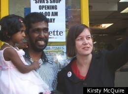 Shopkeeper Siva Kandiah with his daughter and MP Meg Hillier on the day the shop reopened