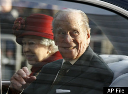 Britain's Queen Elizabeth, left, and Britain's Prince Philip leave following a visit to the Museum of Liverpool in Liverpool, England, Thursday, Dec. 1, 2011. (AP Photo/Tim Hales, Pool)
