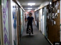 Wheee! Stephan Boyer zips around the MIT campus