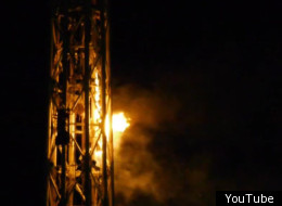 Whoops... flames lick the top of the iconic Melbourne Arts Centre spire